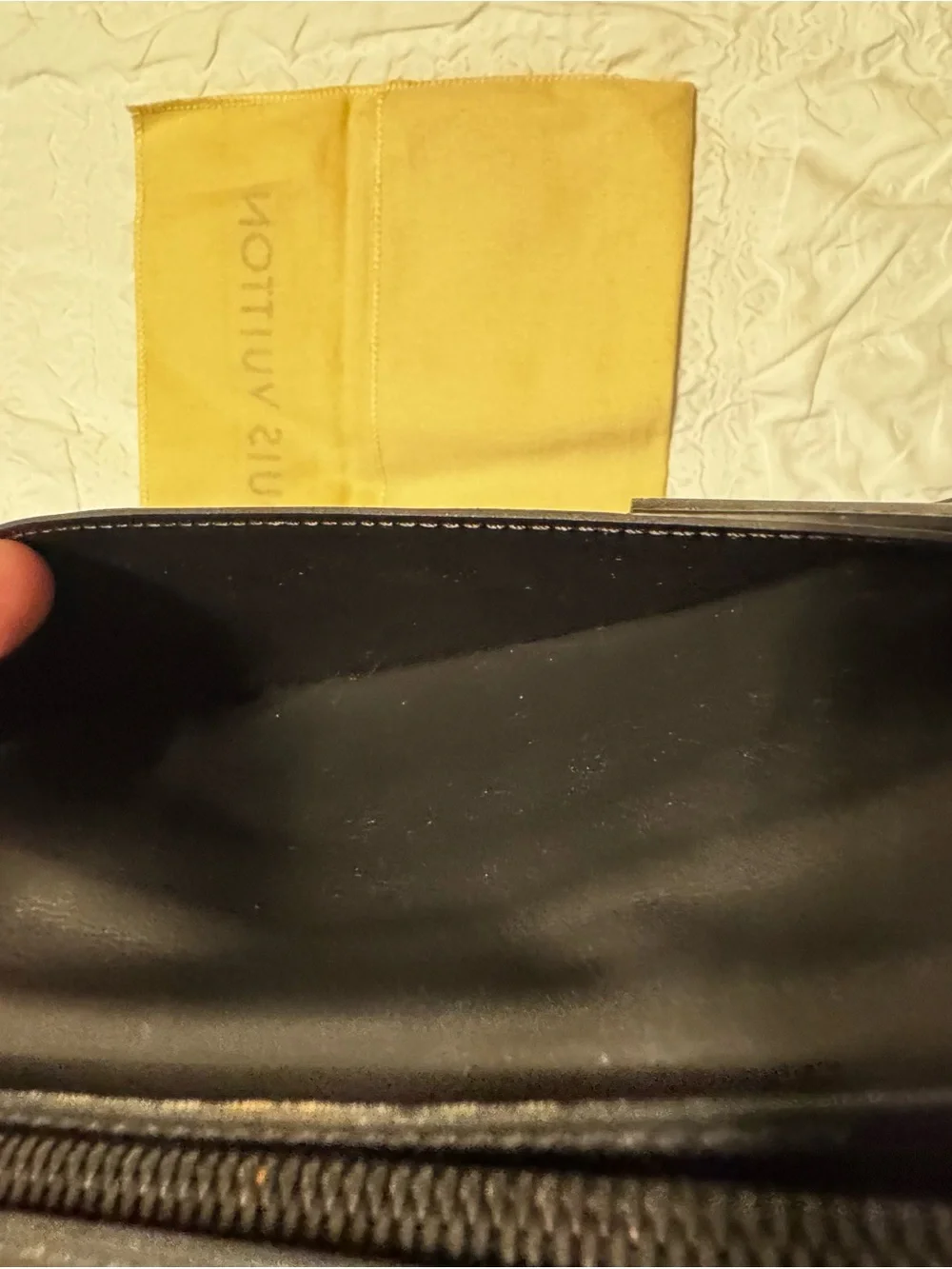 Louis Vuitton Black Embossed 'LOUIS' Leather Long Wallet